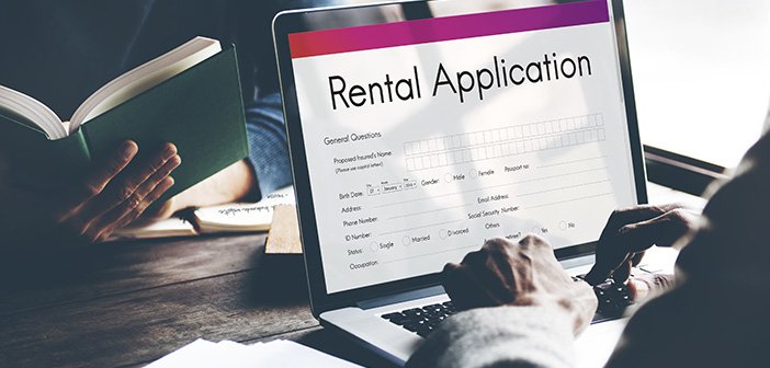tenant filling out rental application